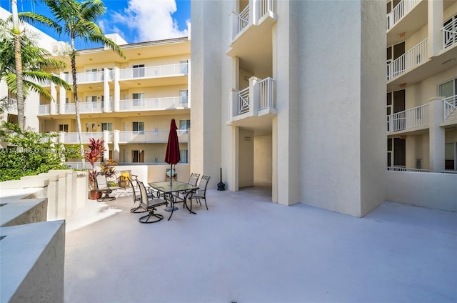 view of patio featuring outdoor dining area