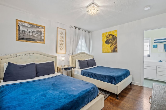 bedroom with wood finished floors