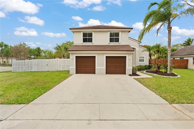 view of front of house featuring stucco siding, driveway, a front lawn, and fence