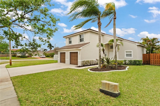 view of front facade with a front yard, fence, an attached garage, stucco siding, and concrete driveway