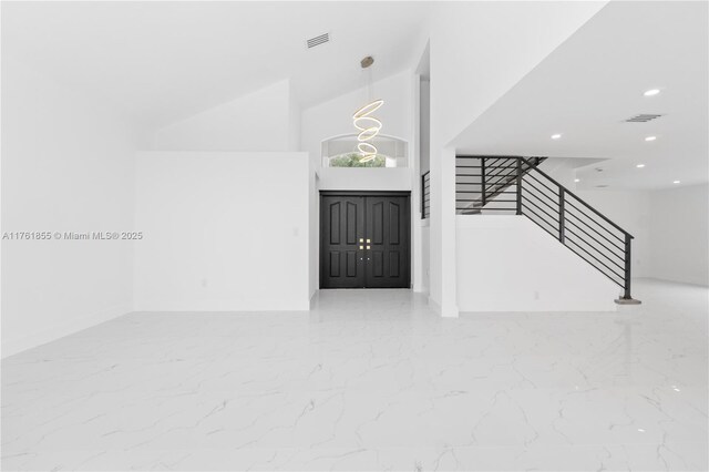 foyer entrance with stairs, recessed lighting, visible vents, and marble finish floor