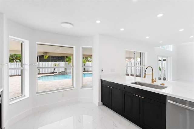 bathroom with recessed lighting, marble finish floor, and vanity