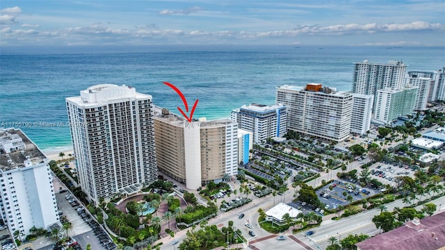 aerial view with a view of city and a water view