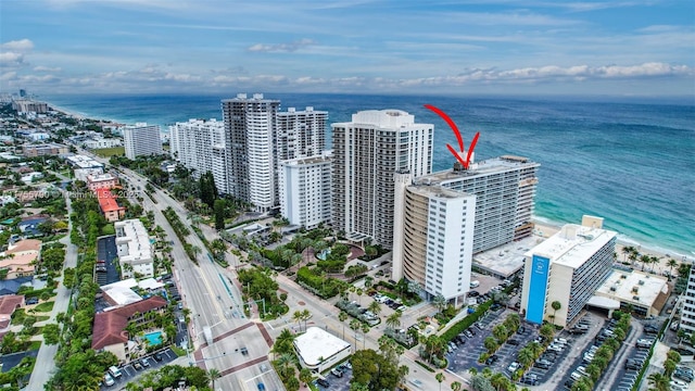 aerial view featuring a view of city and a water view