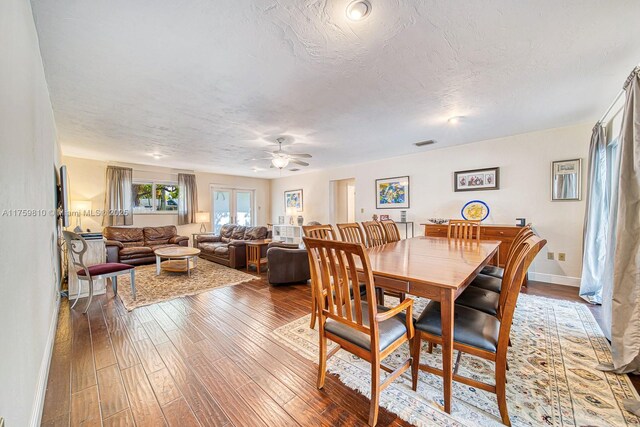 13700 SW 74th Ct, Palmetto Bay, FL 33158 - dining room with hardwood / wood-style floors, ceiling fan, and a textured ceiling
