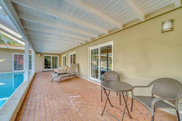 13700 SW 74th Ct, Palmetto Bay, FL 33158 - view of patio / terrace featuring an indoor pool