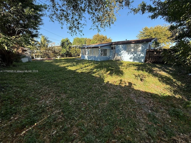 view of yard featuring fence