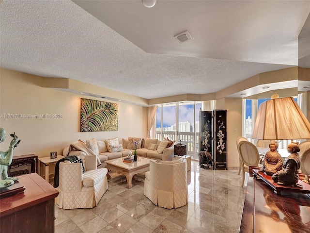 1000 W Island Blvd Unit 2606, Aventura, FL 33160 - living area with a textured ceiling