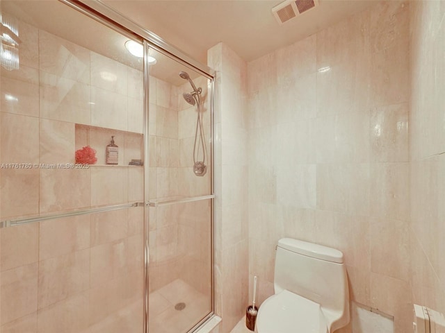 1000 W Island Blvd Unit 2606, Aventura, FL 33160 - full bathroom featuring a shower stall and tile walls