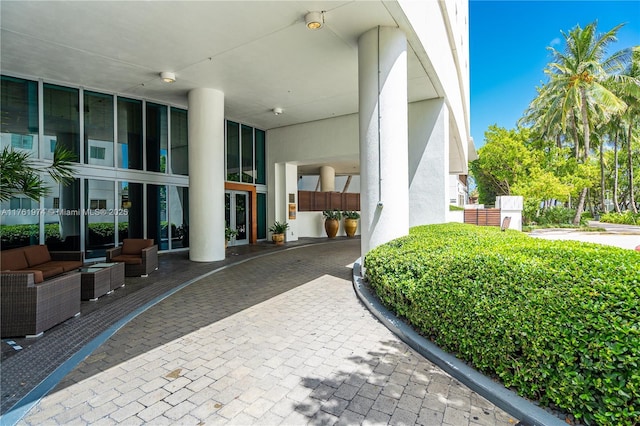 property entrance with stucco siding