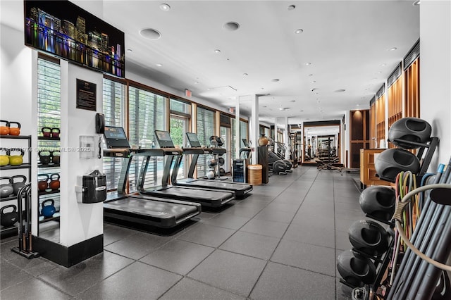 gym featuring recessed lighting and expansive windows