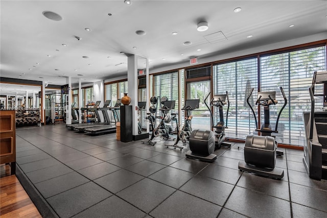 exercise room with recessed lighting