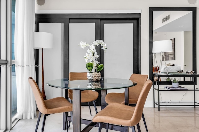 dining space with visible vents