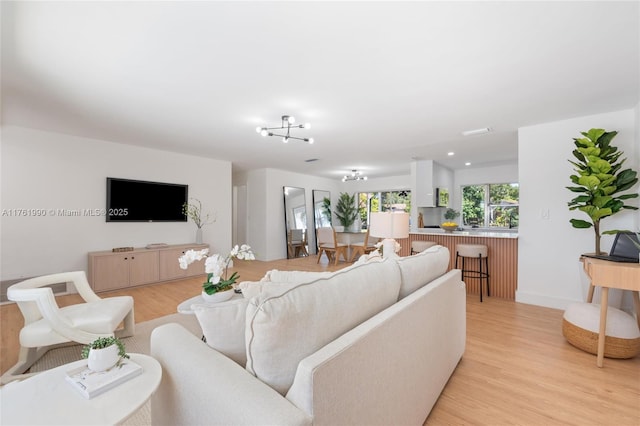 living room featuring light wood-style flooring