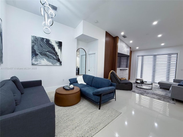 tiled living area featuring recessed lighting, visible vents, baseboards, and lofted ceiling