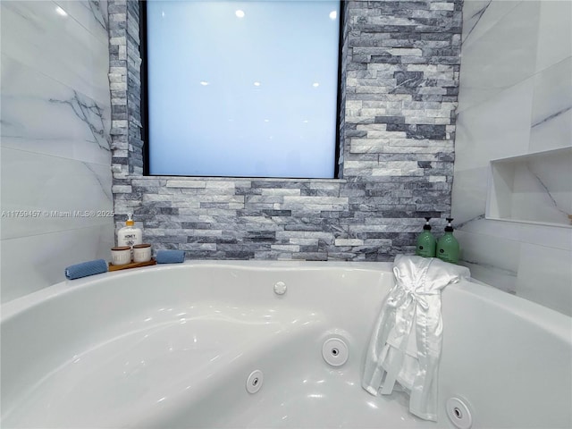 full bath with a jetted tub