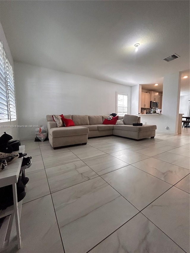 living area with visible vents