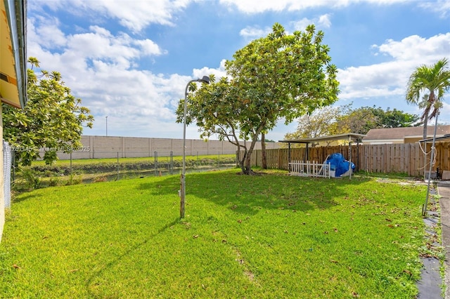 view of yard featuring a fenced backyard