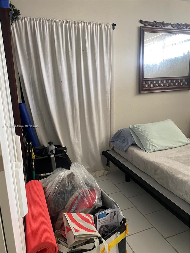 bedroom featuring tile patterned floors