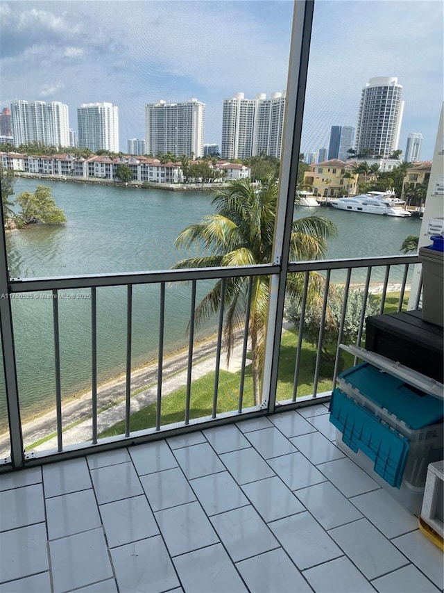 balcony with a city view and a water view