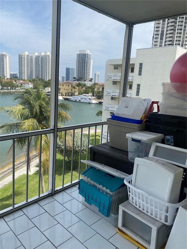 balcony with a city view and a water view