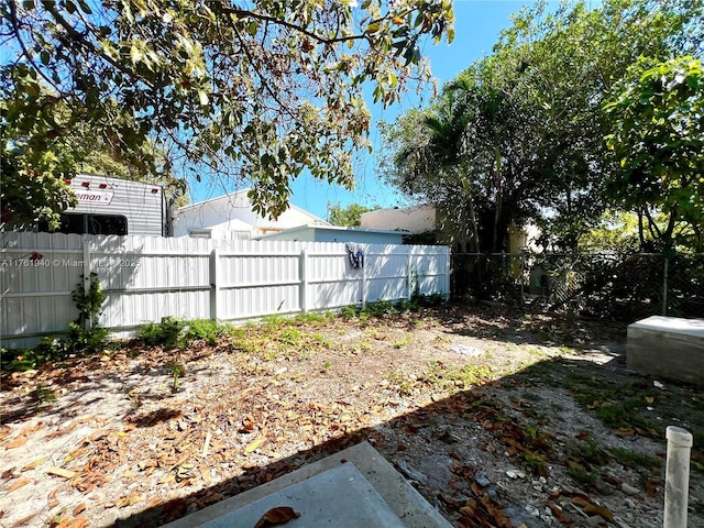 view of yard featuring a fenced backyard