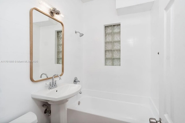 full bathroom featuring shower / washtub combination and toilet