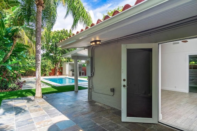 pool featuring a patio area