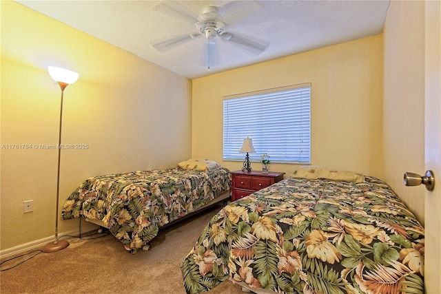 bedroom featuring a ceiling fan and carpet flooring