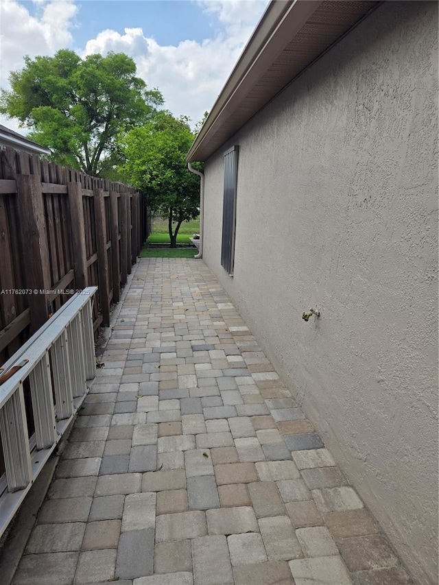 view of patio with fence