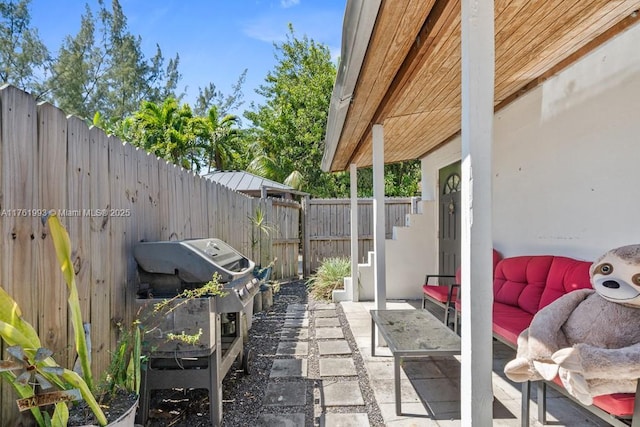 view of patio with a fenced backyard