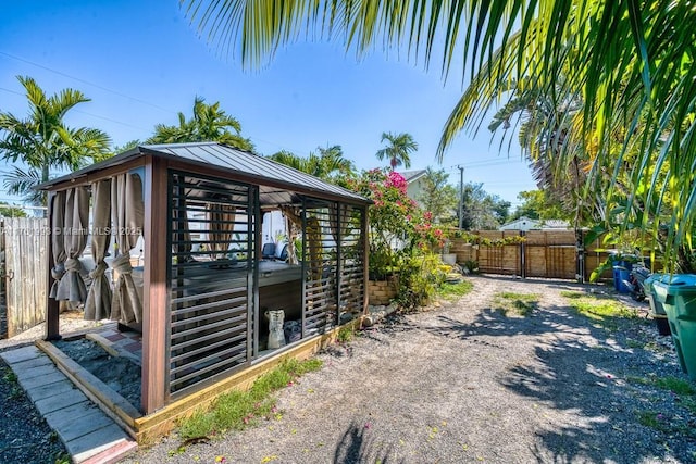 exterior space featuring a gate and fence