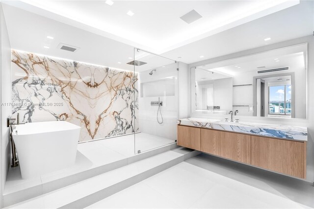 3301 NE 183rd St Unit Ph04, Aventura, FL 33160 - bathroom with a marble finish shower, vanity, and a freestanding tub