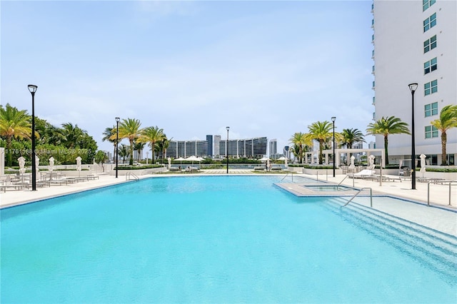 3301 NE 183rd St Unit Ph04, Aventura, FL 33160 - community pool with a hot tub and a patio