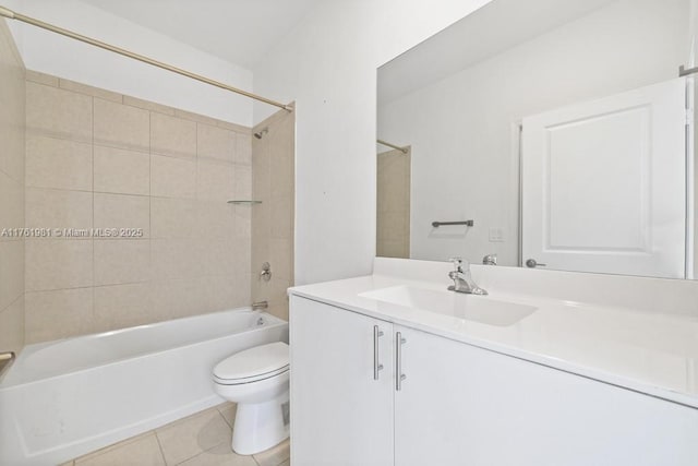 full bath with shower / bathing tub combination, toilet, vanity, and tile patterned flooring