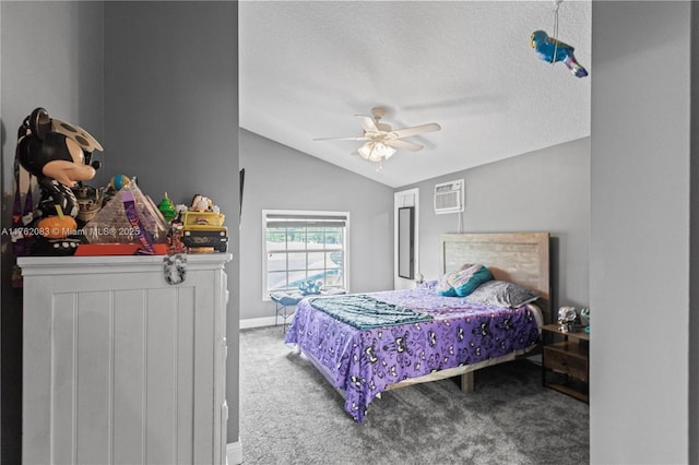 carpeted bedroom with a textured ceiling, vaulted ceiling, baseboards, ceiling fan, and a wall mounted AC