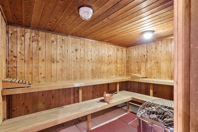 100 Bayview Dr Unit 2128, Sunny Isles Beach, FL 33160 - sauna / steam room with wooden ceiling, wooden walls, and tile patterned floors