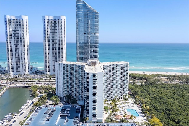 drone / aerial view with a view of city and a water view