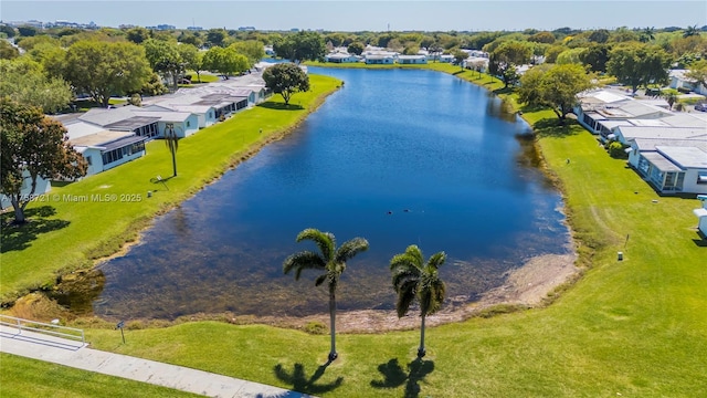 birds eye view of property featuring a residential view and a water view