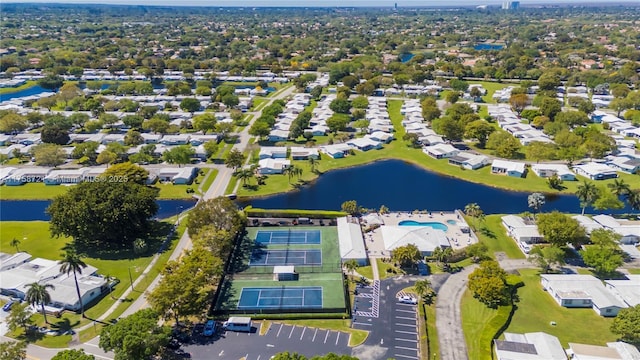 aerial view featuring a residential view and a water view