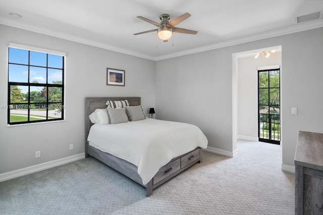 bedroom with visible vents, carpet, baseboards, and ornamental molding