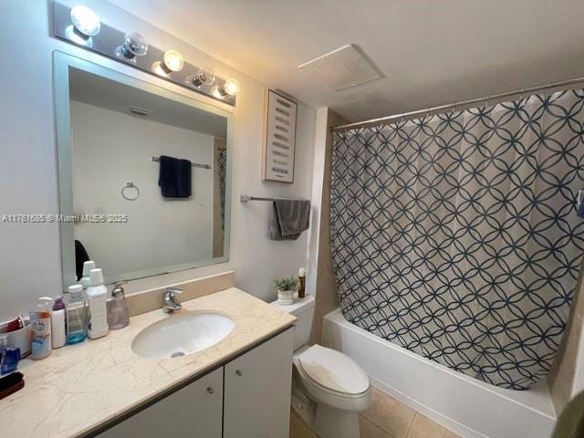 bathroom featuring vanity, shower / tub combo, toilet, and tile patterned flooring