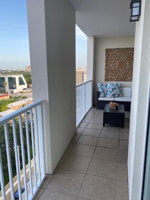 balcony featuring a view of city