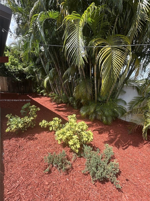 view of yard featuring fence
