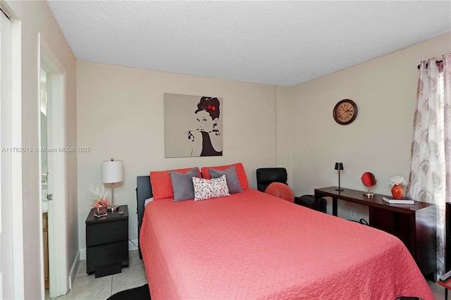 bedroom featuring a textured ceiling