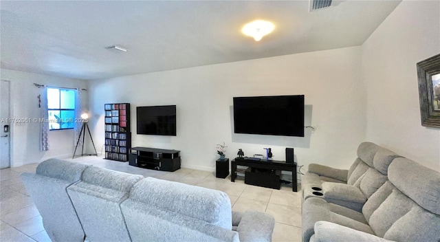 living room with visible vents and light tile patterned flooring