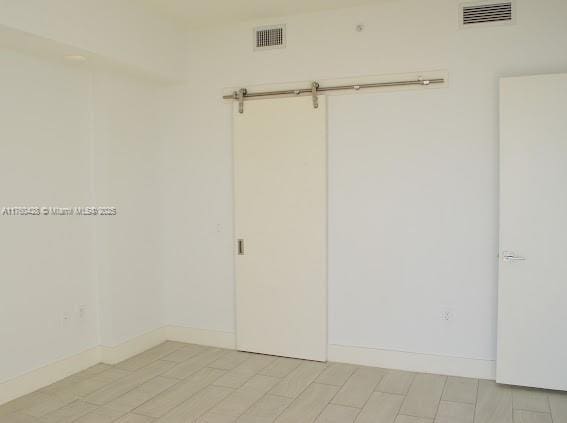 interior space with visible vents and baseboards