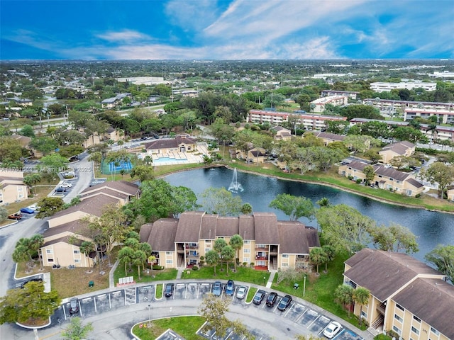 bird's eye view featuring a residential view and a water view