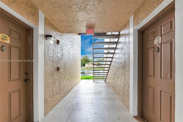 property entrance featuring stucco siding