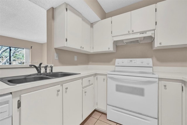 kitchen with under cabinet range hood, electric stove, light tile patterned flooring, a textured ceiling, and a sink